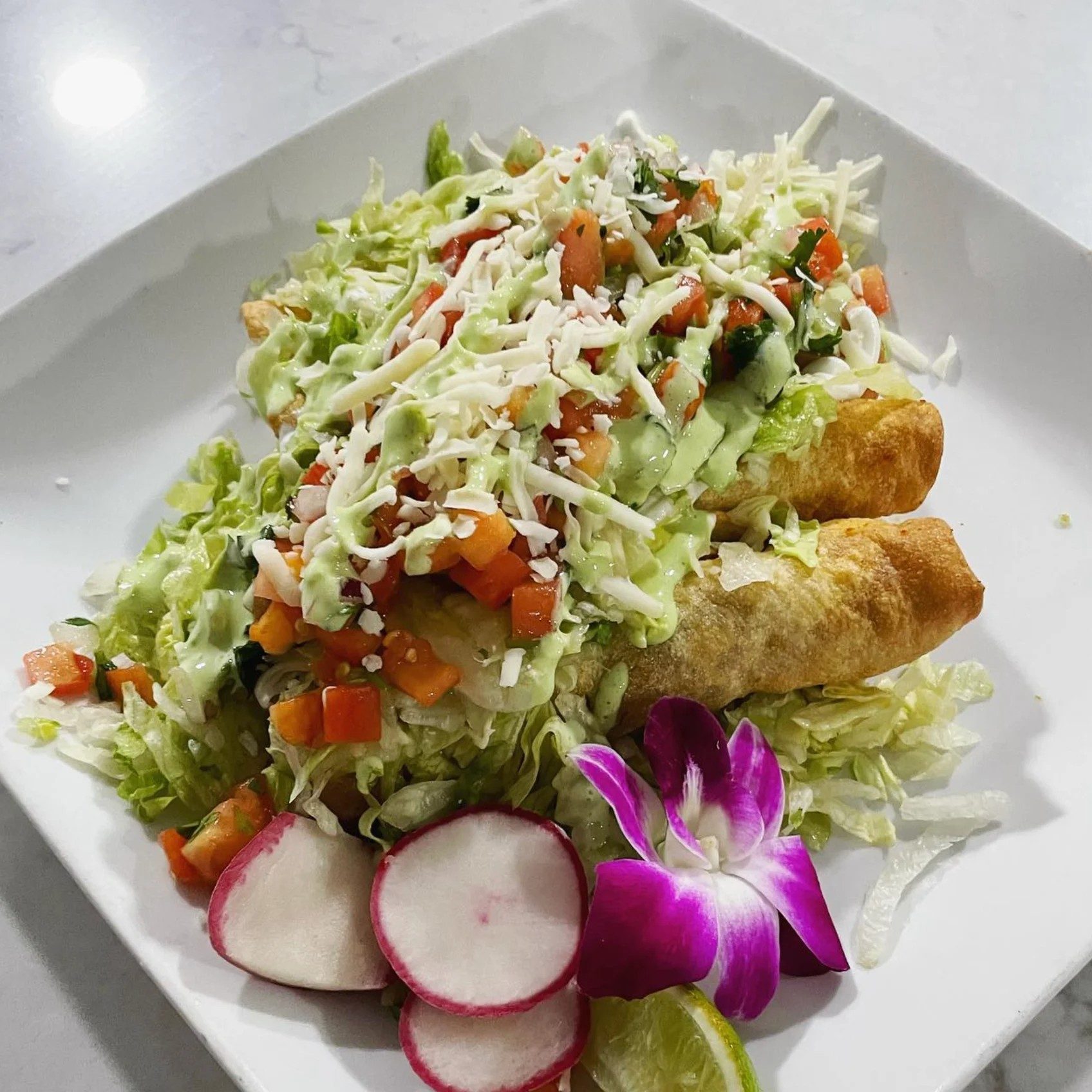 Tres Taquitos.